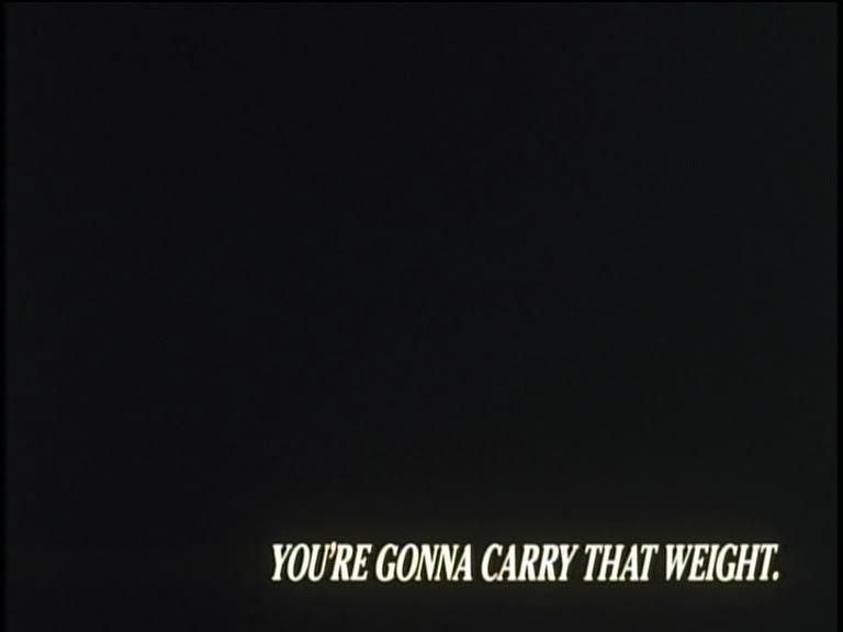 Quadro preto com a frase 'You're gonna carry that weight.' no rodapé. Do desenho 'Cowboy Bebop.'